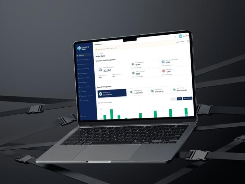 Keystone HRMS dashboard on a laptop